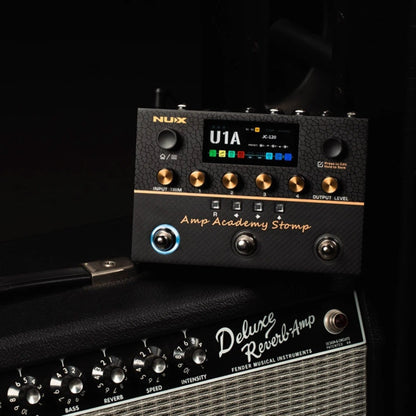 NUX amp academy stomp with LCD screen multi switch pedal stompbox on an amp